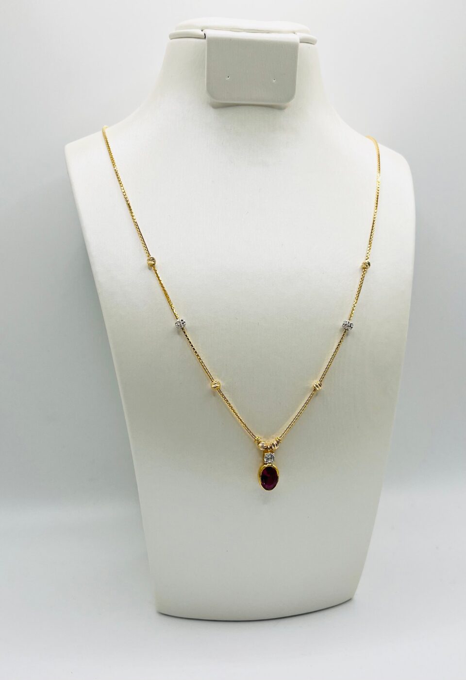 22kt gold two tone necklace with ruby pendant